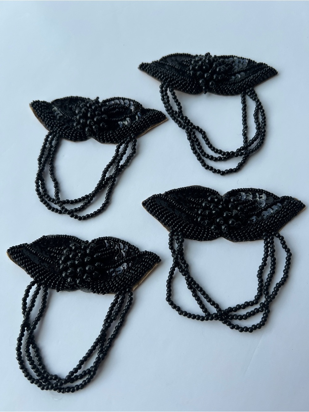 Black beaded Decorative Appliqué with Draped Seed Bead Chains